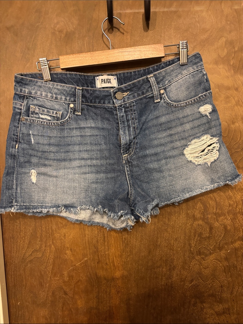 PAIGE Distressed Light Blue Denim Jean Shorts